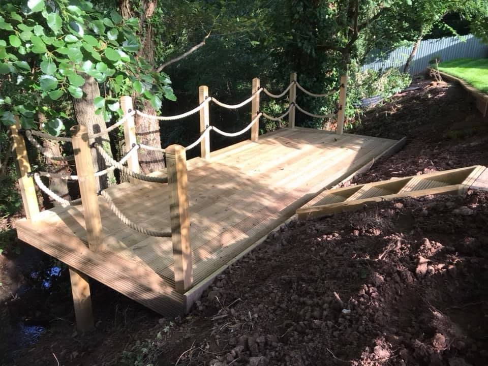 Deck over a river with rope balustrade